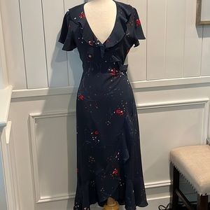 Like new, extremely easy to dress up or down! Soft fabric and wears well….